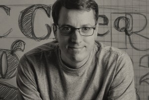 Lsu平面设计明矾肖像，黑白。背景墙上的字母